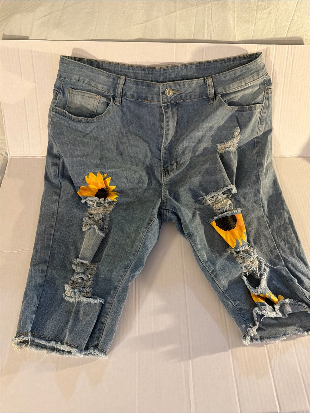 #240 Women's Blue Distressed Denim Jeans with Sunflower Patch